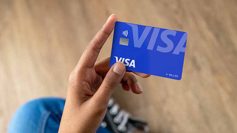 Person holding the new Visa card